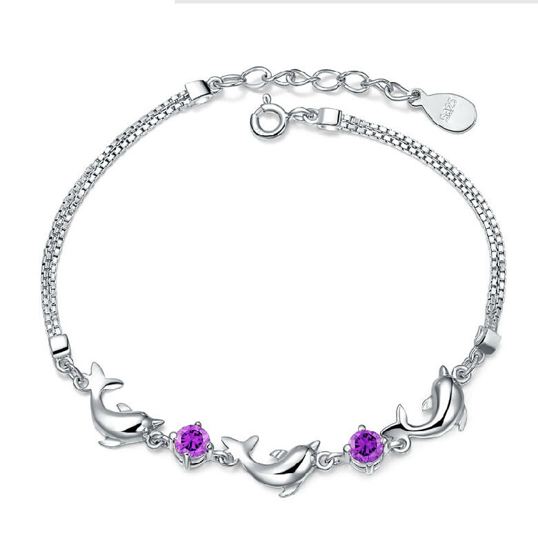 925 Silver Bracelet features dolphin desgin