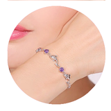925 Silver Bracelet features dolphin desgin
