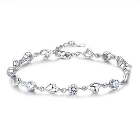 Silver Bracelet features half moon and star desgin