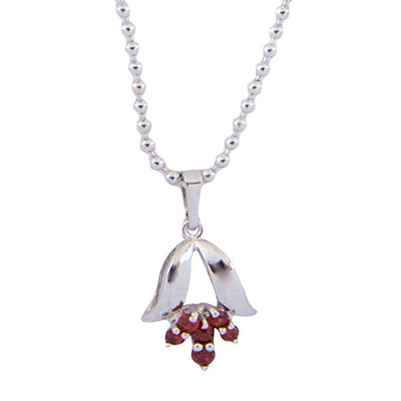 Heart-shaped pendant set with gemstones