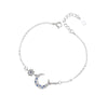 Silver Bracelet features half moon and star desgin