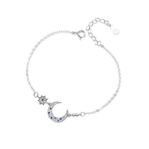 Silver Bracelet features half moon and star desgin